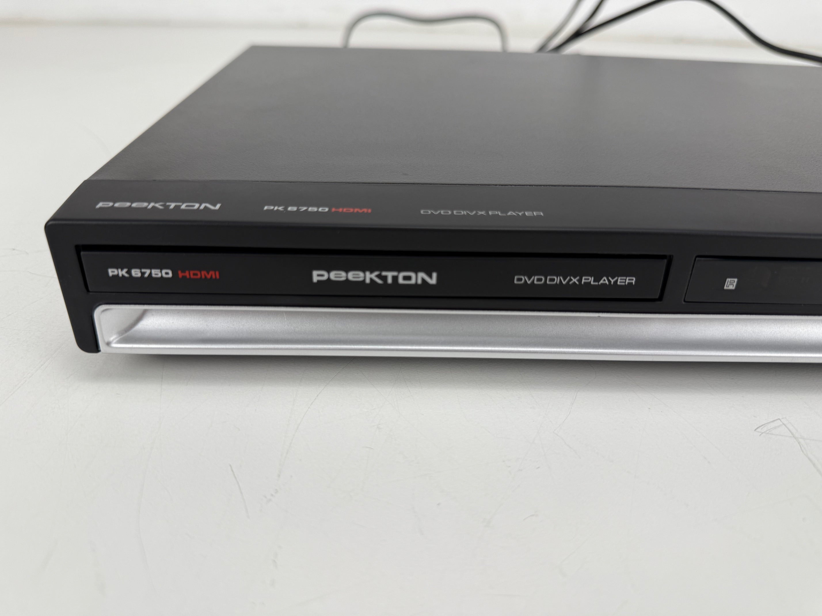 Onbekende PK 6750 HDMI DVD DIVX-speler met originele doos en afstandsbediening