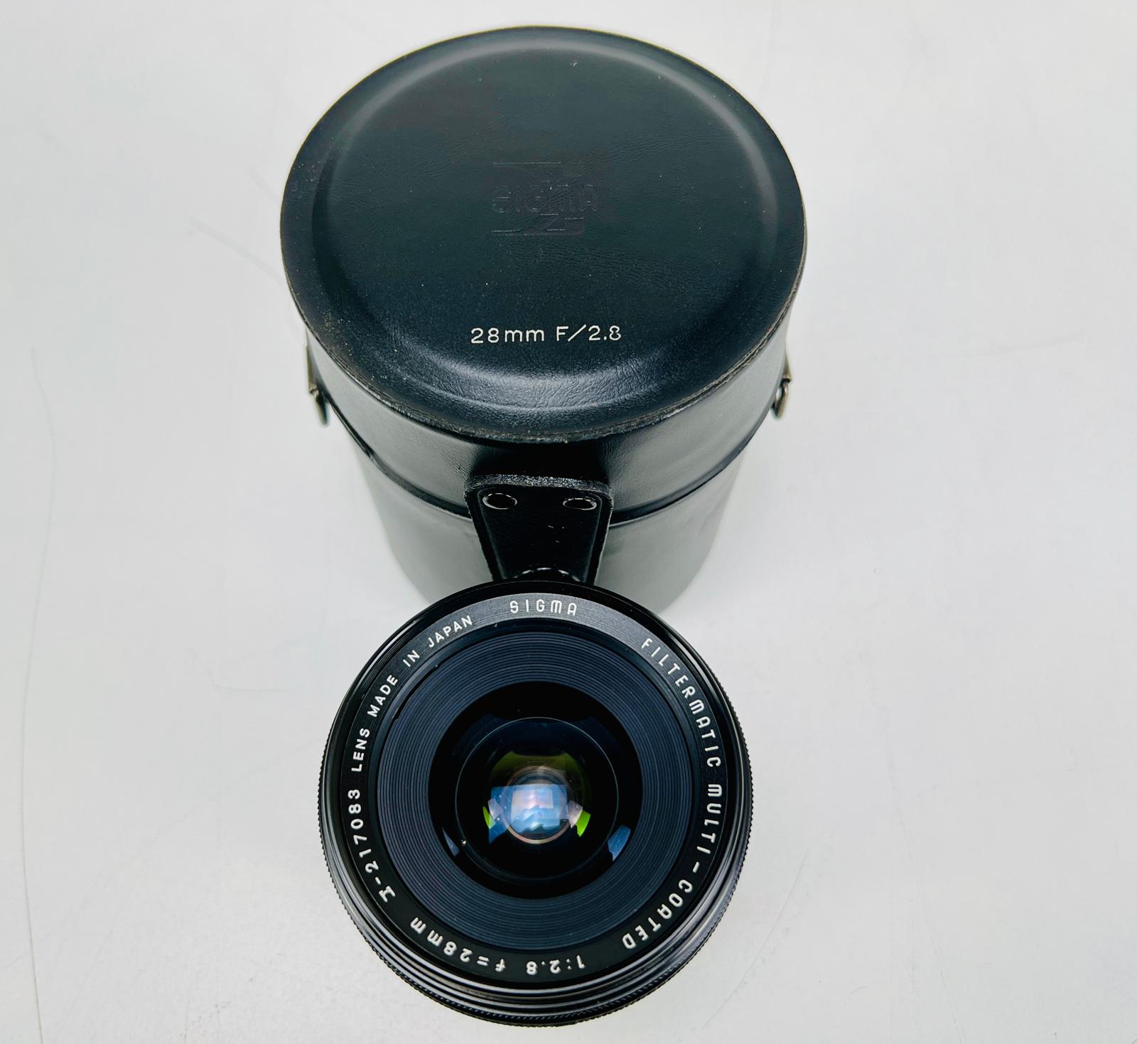 Nikko F401X Film Camera -  Set with 4 Lenses, SB-8E Speedlight - And lots of accessories